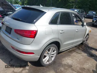 2017 Audi Q3 Premium with VIN WA1ECCFS2HR013647, listed as a IAAI auction lot 42376718 with Not provided miles and . Bid and sale history available at DreamBid. Image 4.
