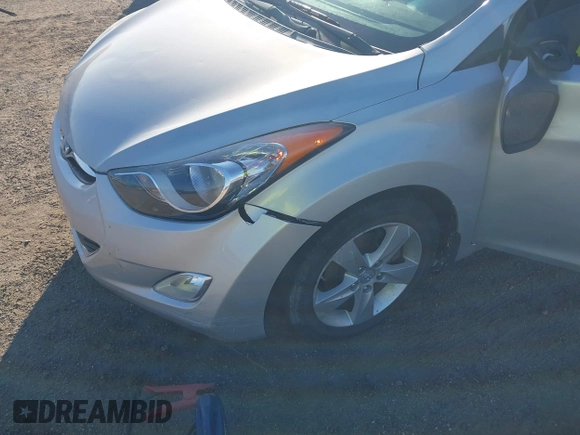 2012 Hyundai Elantra Limited with VIN KMHDH4AE9CU304965, listed as a IAAI auction lot 41752391 with 77,489 mi miles. Bid and sale history available at carsss.com. Image 6.