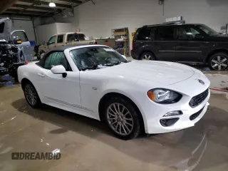2017 FIAT 124 Spider Lusso z VIN JC1NFAEK5H0106151, wystawiony jako Copart lot #88738865 z przebiegiem 81 333 mil mil oraz Szkoda całkowita • Salvage title. Historia ofert i sprzedaży dostępna na DreamBid. Obrazek 4.