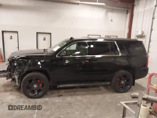 2017 Chevrolet Tahoe LT z VIN 1GNSKBKC6HR310870, wystawiony jako IAAI lot #41975056 z przebiegiem 124 418 mil mil oraz . Historia ofert i sprzedaży dostępna na DreamBid. Obrazek 14.
