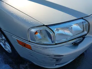 2004 Volvo S80 with VIN YV1TH59H641365689, listed as a IAAI auction lot 41397638 with 171,185 mi miles. Bid and sale history available at carsss.com. Image 6.