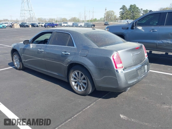 2012 Chrysler 300 Limited with VIN 2C3CCACG9CH199587, listed as a IAAI auction lot 41912142 with 158,065 mi miles. Bid and sale history available at carsss.com. Image 3.