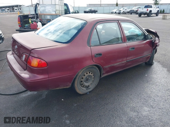 1998 Toyota Corolla VE with VIN 1NXBR12E7WZ070248, listed as a IAAI auction lot 41792397 with Not provided miles and . Bid and sale history available at DreamBid. Image 4.