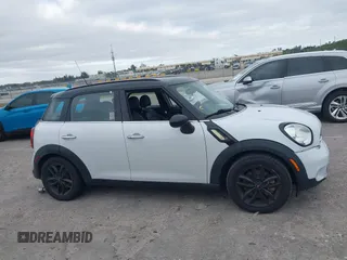 2015 MINI Countryman S z VIN WMWZC3C5XFWP53190, wystawiony jako IAAI lot #41273123 z przebiegiem 163 658 mil mil oraz . Historia ofert i sprzedaży dostępna na DreamBid. Obrazek 13.