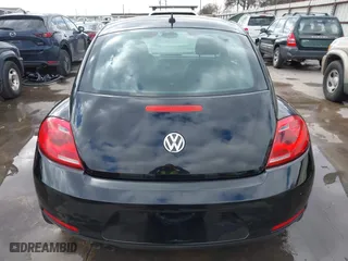 2012 Volkswagen Beetle 2.5L w/Sun/Sound/Nav PZEV with VIN 3VWHP7AT0CM623536, listed as a IAAI auction lot 41351333 with 106,600 mi miles. Bid and sale history available at carsss.com. Image 16.