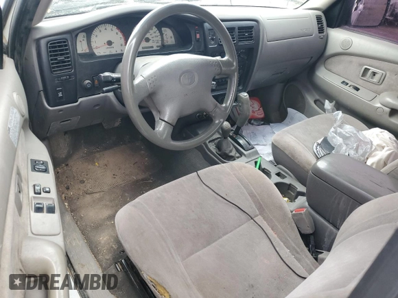 2002 Toyota Tacoma z VIN 5TEWN72N42Z895430, wystawiony jako Copart lot #57458155 z przebiegiem Nie podano mil oraz Szkoda całkowita • Salvage title. Historia ofert i sprzedaży dostępna na DreamBid. Obrazek 8.