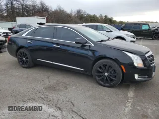 2017 Cadillac XTS Luxury z VIN 2G61M5S38H9165134, wystawiony jako Copart lot #87735945 z przebiegiem 118 643 mil mil oraz Nie do naprawy. Historia ofert i sprzedaży dostępna na DreamBid. Obrazek 4.