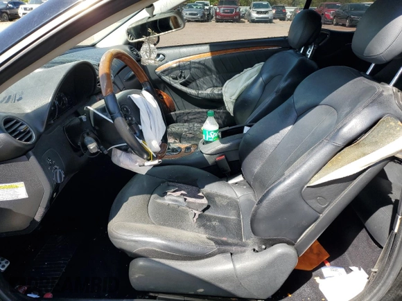 2009 Mercedes-Benz CLK 350 with VIN WDBTK56F39T108770, listed as a Copart auction lot 52892915 with 148,142 mi miles and Salvage Title. Bid and sale history available at DreamBid. Image 7.
