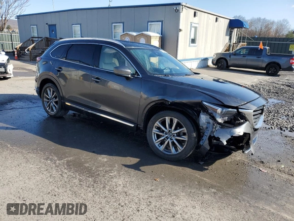 2019 Mazda CX-9 Grand Touring with VIN JM3TCBDY3K0336929, listed as a Copart auction lot 52980005 with 70,878 mi miles and Salvage title. Bid and sale history available at DreamBid. Image 4.