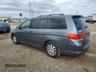 2010 Honda Odyssey EX-L with VIN 5FNRL3H72AB055070, listed as a Copart auction lot 80328974 with 221,467 mi miles and Salvage Title. Bid and sale history available at DreamBid. Image 2.