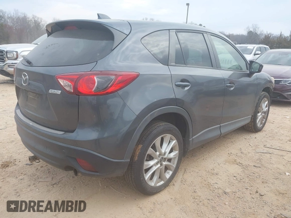 2013 Mazda CX-5 Grand Touring with VIN JM3KE4DE2D0164225, listed as a IAAI auction lot 41663412 with 162,738 mi miles. Bid and sale history available at carsss.com. Image 4.