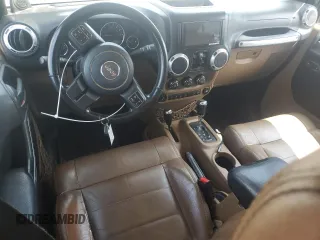 2012 Jeep Wrangler Unlimited Altitude with VIN 1C4HJWEG4CL117480, listed as a Copart auction lot 53700755 with 131,849 mi miles and Salvage title. Bid and sale history available at DreamBid. Image 8.