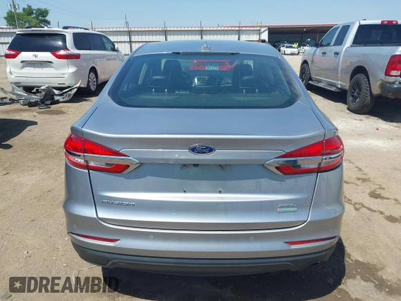 2020 Ford Fusion SEL with VIN 3FA6P0CDXLR196124, listed as a IAAI auction lot 42244231 with 99,306 mi miles and . Bid and sale history available at DreamBid. Image 17.