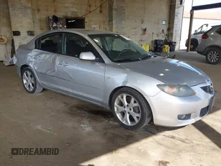 2009 Mazda 3 i Touring Value with VIN JM1BK32G891191740, listed as a IAAI auction lot 42140346 with 208,449 mi miles and . Bid and sale history available at DreamBid. Image 1.