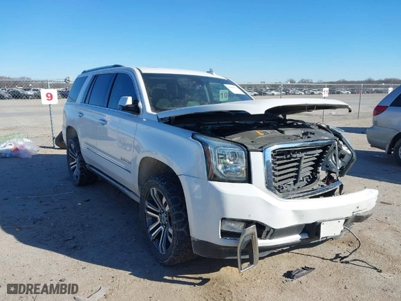 2017 GMC Yukon Denali with VIN 1GKS2CKJ3HR265680, listed as a IAAI auction lot 41411973 with 200,749 mi miles. Bid and sale history available at carsss.com. Image 1.