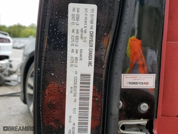 2012 Dodge Charger SRT8 with VIN 2C3CDXEJ8CH217246, listed as a Copart auction lot 71079334 with 105,528 mi miles and Salvage Title. Bid and sale history available at carsss.com. Image 12.