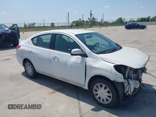 2014 Nissan Versa SV with VIN 3N1CN7AP7EL866987, listed as a IAAI auction lot 42229340 with 127,643 mi miles. Bid and sale history available at carsss.com. Image 1.