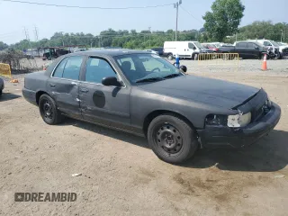 2007 Ford Police Interceptor z VIN 2FAFP71WX7X156954, wystawiony jako Copart lot #60929015 z przebiegiem 174 531 mil mil oraz Szkoda całkowita • Salvage title. Historia ofert i sprzedaży dostępna na DreamBid. Obrazek 4.