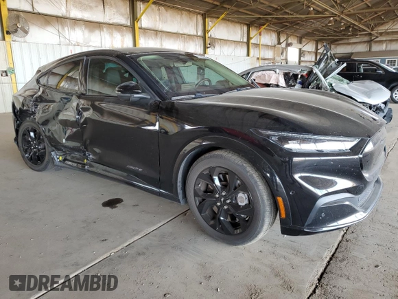 2023 Ford Mustang Mach-E Premium with VIN 3FMTK3R72PMA02392, listed as a Copart auction lot 63351565 with 35,836 mi miles and Salvage title. Bid and sale history available at DreamBid. Image 4.
