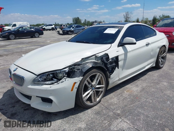 2014 BMW 6 Series 650i with VIN WBAYM9C55ED248244, listed as a IAAI auction lot 42043456 with 144,664 mi miles and . Bid and sale history available at DreamBid. Image 17.