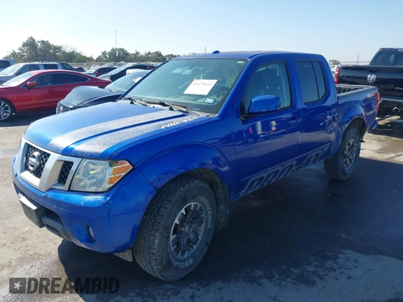 2014 Nissan Frontier SV with VIN 1N6AD0EV4EN720325, listed as a IAAI auction lot 41479133 with 61,661 mi miles and . Bid and sale history available at DreamBid. Image 2.