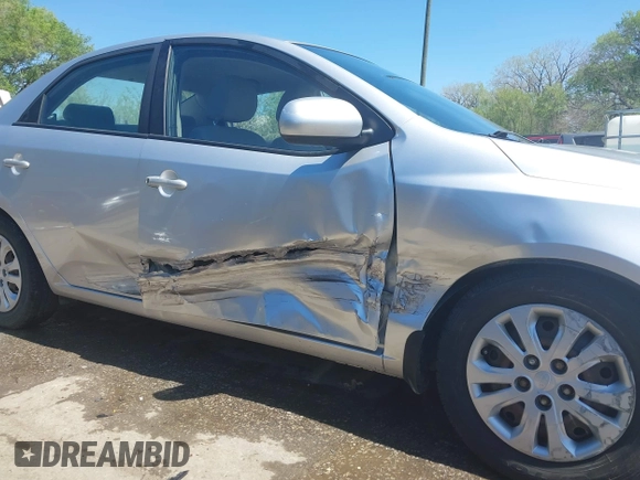 2010 Kia Forte LX with VIN KNAFT4A29A5061695, listed as a IAAI auction lot 42034559 with 114,470 mi miles. Bid and sale history available at carsss.com. Image 6.