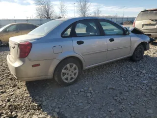 2005 Suzuki Forenza S z VIN KL5JD56Z95K119565, wystawiony jako Copart lot #43051135 z przebiegiem 143 172 mil mil oraz Nie do naprawy • Non repairable. Historia ofert i sprzedaży dostępna na DreamBid. Obrazek 3.