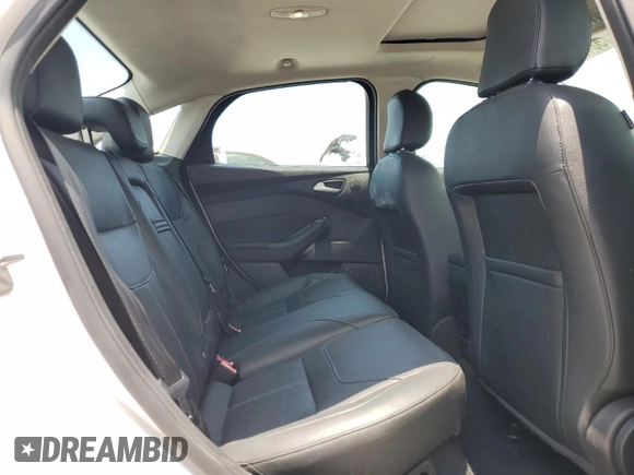 2015 Ford Focus Titanium с VIN 1FADP3J24FL304136, выставлен на аукционе Copart как лот 58428865 с пробегом 81 668 миль миль и Списание • Salvage title. История ставок и продаж доступна на DreamBid. Изображение 10.