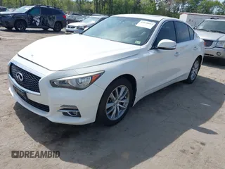2015 Infiniti Q50 Premium with VIN JN1BV7AR0FM421592, listed as a IAAI auction lot 42070055 with 161,038 mi miles. Bid and sale history available at carsss.com. Image 2.