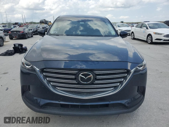2020 Mazda CX-9 Touring with VIN JM3TCACY1L0423340, listed as a Copart auction lot 57389305 with 64,737 mi miles and Salvage title. Bid and sale history available at DreamBid. Image 5.