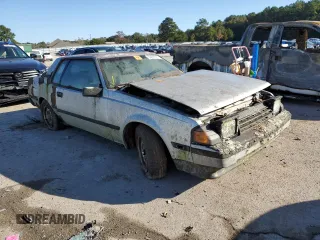 1984 Toyota Celica z VIN JT2RA64C7E6218560, wystawiony jako Copart lot #63087872 z przebiegiem 168 288 mil mil oraz Czysty tytuł • Clean title. Historia ofert i sprzedaży dostępna na DreamBid. Obrazek 1.
