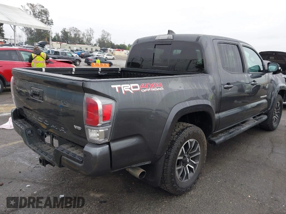 2020 Toyota Tacoma SR5 z VIN 3TMCZ5AN6LM323920, wystawiony jako IAAI lot #41885427 z przebiegiem 153 952 mil mil oraz . Historia ofert i sprzedaży dostępna na DreamBid. Obrazek 4.
