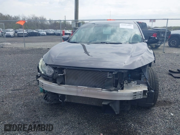 2016 Honda Civic Sedan LX with VIN 2HGFC2F51GH524197, listed as a IAAI auction lot 42012886 with 103,302 mi miles. Bid and sale history available at carsss.com. Image 13.