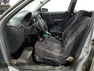 2001 Volkswagen Golf z VIN 9BWGD61J714058300, wystawiony jako Copart lot #77449634 z przebiegiem 137 048 mil mil oraz Szkoda całkowita • Salvage title. Historia ofert i sprzedaży dostępna na DreamBid. Obrazek 7.