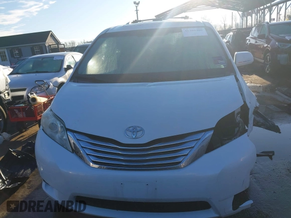 2012 Toyota Sienna XLE with VIN 5TDDK3DCXCS032344, listed as a IAAI auction lot 41205400 with 105,274 mi miles. Bid and sale history available at carsss.com. Image 13.