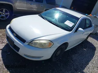 2010 Chevrolet Impala Police Police with VIN 2G1WD5EMXA1228853, listed as a IAAI auction lot 41662690 with 255,458 mi miles. Bid and sale history available at carsss.com. Image 2.