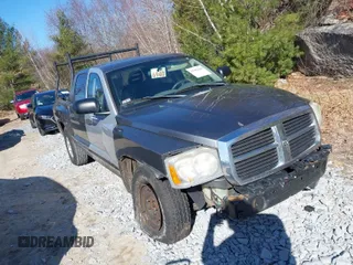 2005 Dodge Dakota with VIN 1D3HW58N25S295524, listed as a IAAI auction lot 41882204 with 216,659 mi miles and . Bid and sale history available at DreamBid. Image 1.