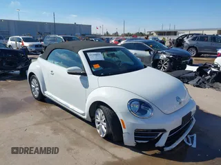 2019 Volkswagen Beetle S with VIN 3VW5DAAT0KM507437, listed as a IAAI auction lot 41380821 with 28,010 mi miles and . Bid and sale history available at DreamBid. Image 1.