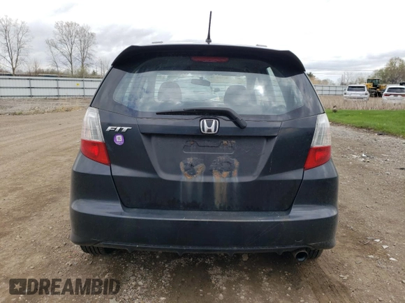 2013 Honda Fit Sport with VIN JHMGE8H51DC009050, listed as a Copart auction lot 53913855 with 207,199 mi miles and Salvage Title. Bid and sale history available at carsss.com. Image 6.