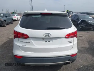 2014 Hyundai Santa Fe z VIN 5XYZTDLB1EG197765, wystawiony jako IAAI lot #41999374 z przebiegiem 172 430 mil mil oraz . Historia ofert i sprzedaży dostępna na DreamBid. Obrazek 16.