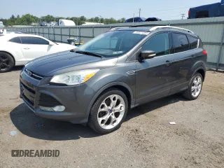 2015 Ford Escape Titanium z VIN 1FMCU9J97FUA38731, wystawiony jako Copart lot #60621085 z przebiegiem 119 704 mil mil oraz Szkoda całkowita • Salvage title. Historia ofert i sprzedaży dostępna na DreamBid. Obrazek 1.