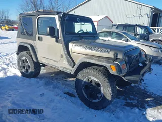 2004 Jeep Wrangler Sahara with VIN 1J4FA59S94P731123, listed as a IAAI auction lot 41288284 with 138,515 mi miles. Bid and sale history available at carsss.com. Image 1.