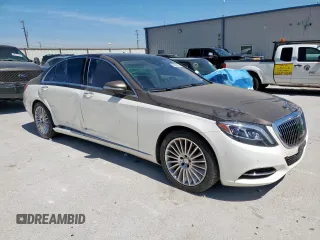 2015 Mercedes-Benz S with VIN WDDUG7GB7FA135269, listed as a Copart auction lot 50254395 with 63,458 mi miles and Salvage Title. Bid and sale history available at DreamBid. Image 4.