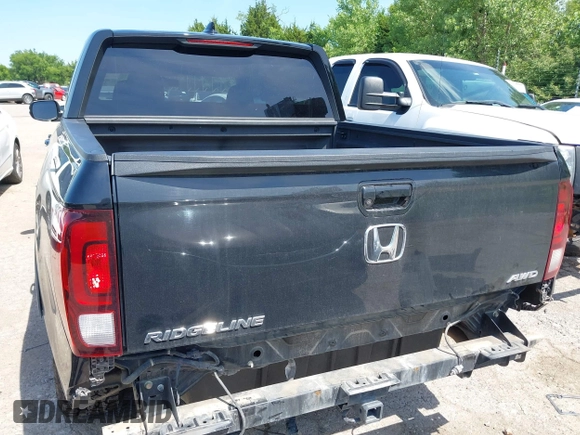 2018 Honda Ridgeline RTL-T with VIN 5FPYK3F67JB013171, listed as a IAAI auction lot 42498827 with 124,415 mi miles and . Bid and sale history available at DreamBid. Image 6.