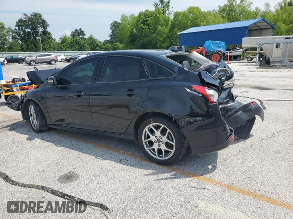 2015 Ford Focus SE with VIN 1FADP3F24FL201209, listed as a Copart auction lot 60474755 with 174,194 mi miles and Salvage title. Bid and sale history available at DreamBid. Image 2.