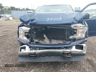 2018 Ford F-150 XL with VIN 1FTEW1EP6JKF00220, listed as a IAAI auction lot 42669759 with 93,996 mi miles and . Bid and sale history available at DreamBid. Image 6.
