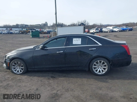 2015 Cadillac CTS Luxury AWD with VIN 1G6AX5SX3F0130311, listed as a IAAI auction lot 41299375 with 134,793 mi miles and . Bid and sale history available at DreamBid. Image 14.