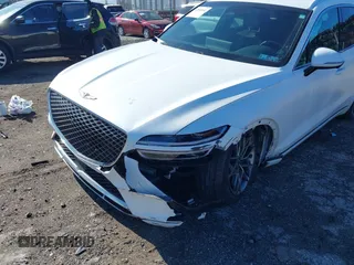 2022 Genesis GV70 2.5T with VIN KMUMADTB5NU051297, listed as a IAAI auction lot 41892642 with 46,421 mi miles and . Bid and sale history available at DreamBid. Image 6.