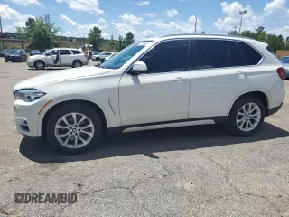 2015 BMW X5 xDrive50i z VIN 5UXKR6C55F0J79488, wystawiony jako Copart lot #56937235 z przebiegiem 128 830 mil mil oraz Tytuł czysty. Historia ofert i sprzedaży dostępna na DreamBid. Obrazek 1.