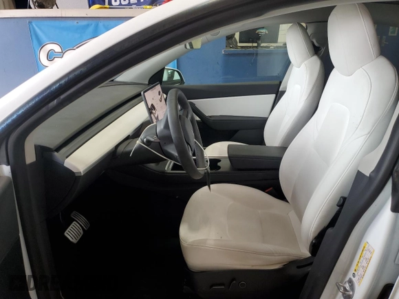 2022 Tesla Model Y Performance with VIN 7SAYGDEF9NF405370, listed as a Copart auction lot 43621095 with 52,292 mi miles and Salvage Title. Bid and sale history available at DreamBid. Image 7.